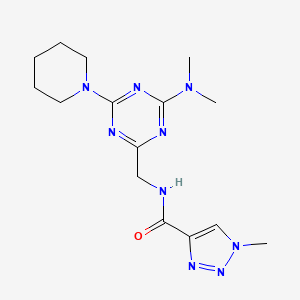 molecular formula C15H23N9O B2550911 N-((4-(dimethylamino)-6-(piperidin-1-yl)-1,3,5-triazin-2-yl)methyl)-1-methyl-1H-1,2,3-triazole-4-carboxamide CAS No. 2034407-42-4
