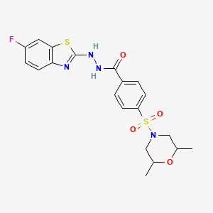 B2551636 4-((2,6-dimethylmorpholino)sulfonyl)-N'-(6-fluorobenzo[d]thiazol-2-yl)benzohydrazide CAS No. 851980-07-9