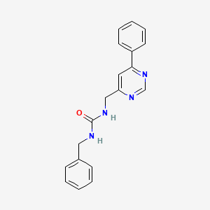 molecular formula C19H18N4O B2551911 1-Benzyl-3-((6-phenylpyrimidin-4-yl)methyl)urea CAS No. 2177366-25-3