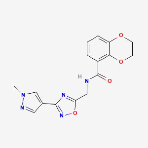 molecular formula C16H15N5O4 B2553925 N-((3-(1-methyl-1H-pyrazol-4-yl)-1,2,4-oxadiazol-5-yl)methyl)-2,3-dihydrobenzo[b][1,4]dioxine-5-carboxamide CAS No. 2034297-45-3