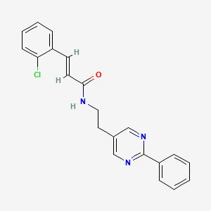 (E)-3-(2-chlorophenyl)-N-(2-(2-phenylpyrimidin-5-yl)ethyl)acrylamide