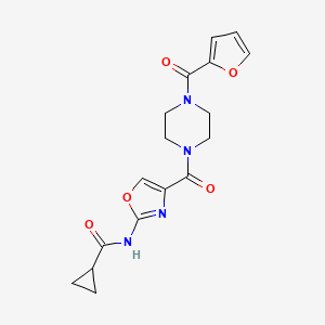 N-(4-(4-(furan-2-carbonyl)piperazine-1-carbonyl)oxazol-2-yl)cyclopropanecarboxamide