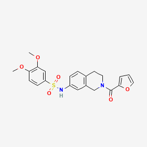 molecular formula C22H22N2O6S B2554179 N-(2-(furan-2-carbonyl)-1,2,3,4-tetrahydroisoquinolin-7-yl)-3,4-dimethoxybenzenesulfonamide CAS No. 955534-16-4