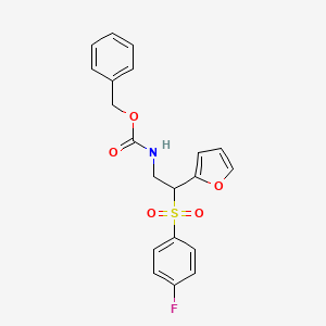 molecular formula C20H18FNO5S B2554743 苯甲酸(2-((4-氟苯基)磺酰基)-2-(呋喃-2-基)乙基)氨基甲酸酯 CAS No. 896311-65-2