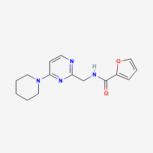 B2555382 N-((4-(piperidin-1-yl)pyrimidin-2-yl)methyl)furan-2-carboxamide CAS No. 1797292-04-6