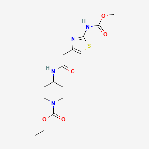 molecular formula C15H22N4O5S B2555831 Ethyl 4-(2-(2-((methoxycarbonyl)amino)thiazol-4-yl)acetamido)piperidine-1-carboxylate CAS No. 946236-33-5