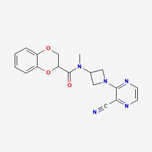 molecular formula C18H17N5O3 B2555942 N-[1-(3-Cyanopyrazin-2-yl)azetidin-3-yl]-N-methyl-2,3-dihydro-1,4-benzodioxine-3-carboxamide CAS No. 2380171-60-6