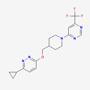 molecular formula C18H20F3N5O B2556308 3-Cyclopropyl-6-[[1-[6-(trifluoromethyl)pyrimidin-4-yl]piperidin-4-yl]methoxy]pyridazine CAS No. 2309587-96-8