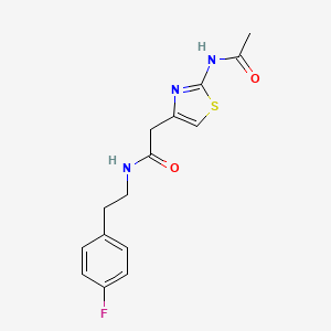 B2556512 2-(2-acetamidothiazol-4-yl)-N-(4-fluorophenethyl)acetamide CAS No. 1234987-88-2
