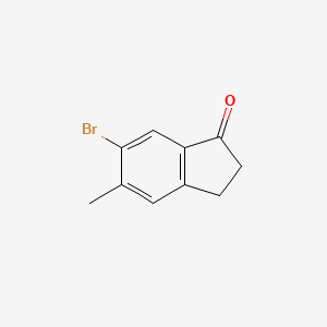 molecular formula C10H9BrO B2556613 6-溴-5-甲基-2,3-二氢-1H-茚-1-酮 CAS No. 1147548-82-0