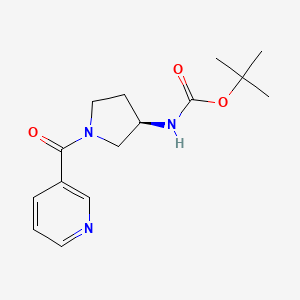 molecular formula C15H21N3O3 B2557350 (R)-tert-Butyl 1-nicotinoylpyrrolidin-3-ylcarbamate CAS No. 1286208-26-1