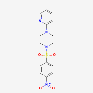 molecular formula C15H16N4O4S B2557477 1-[(4-ニトロフェニル)スルホニル]-4-(2-ピリジニル)ピペラジン CAS No. 71422-42-9