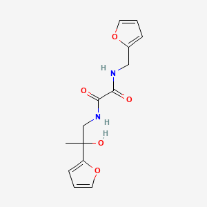 molecular formula C14H16N2O5 B2557796 N1-(2-(furan-2-yl)-2-hydroxypropyl)-N2-(furan-2-ylmethyl)oxalamide CAS No. 2034567-61-6