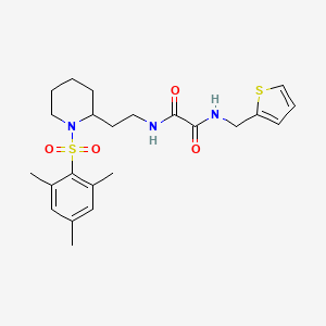 molecular formula C23H31N3O4S2 B2557866 N1-(2-(1-(mesitylsulfonyl)piperidin-2-yl)ethyl)-N2-(thiophen-2-ylmethyl)oxalamide CAS No. 898415-60-6