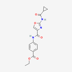 molecular formula C17H17N3O5 B2558456 苯甲酸乙酯-4-(2-(环丙烷甲酰胺)恶唑-4-甲酰胺) CAS No. 1396784-25-0