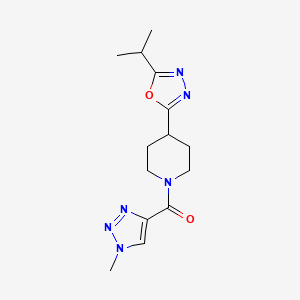 molecular formula C14H20N6O2 B2559068 (4-(5-isopropyl-1,3,4-oxadiazol-2-yl)piperidin-1-yl)(1-methyl-1H-1,2,3-triazol-4-yl)methanone CAS No. 1421524-49-3