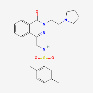 molecular formula C23H28N4O3S B2559687 2,5-dimethyl-N-((4-oxo-3-(2-(pyrrolidin-1-yl)ethyl)-3,4-dihydrophthalazin-1-yl)methyl)benzenesulfonamide CAS No. 1448051-83-9