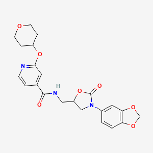 molecular formula C22H23N3O7 B2559709 N-((3-(benzo[d][1,3]dioxol-5-yl)-2-oxooxazolidin-5-yl)methyl)-2-((tetrahydro-2H-pyran-4-yl)oxy)isonicotinamide CAS No. 2034615-84-2