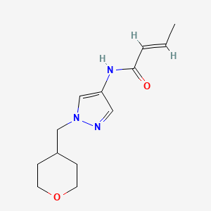 molecular formula C13H19N3O2 B2559926 (E)-N-(1-((tetrahydro-2H-pyran-4-yl)methyl)-1H-pyrazol-4-yl)but-2-enamide CAS No. 1706508-34-0