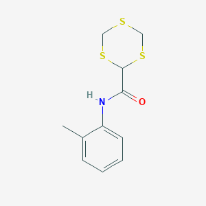 molecular formula C11H13NOS3 B256062 N-(2-methylphenyl)-1,3,5-trithiane-2-carboxamide 