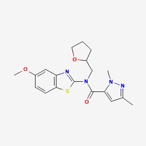 molecular formula C19H22N4O3S B2561239 N-(5-methoxybenzo[d]thiazol-2-yl)-1,3-dimethyl-N-((tetrahydrofuran-2-yl)methyl)-1H-pyrazole-5-carboxamide CAS No. 1013796-24-1