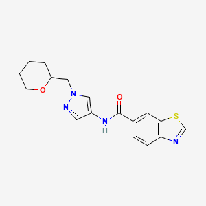 molecular formula C17H18N4O2S B2561249 N-(1-((tetrahydro-2H-pyran-2-yl)methyl)-1H-pyrazol-4-yl)benzo[d]thiazole-6-carboxamide CAS No. 2034227-80-8