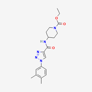 molecular formula C19H25N5O3 B2561533 4-({[1-(3,4-二甲苯基)-1H-1,2,3-三唑-4-基]羰基}氨基)哌啶-1-羧酸乙酯 CAS No. 1326839-71-7