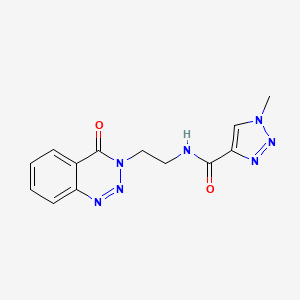 molecular formula C13H13N7O2 B2561814 1-methyl-N-(2-(4-oxobenzo[d][1,2,3]triazin-3(4H)-yl)ethyl)-1H-1,2,3-triazole-4-carboxamide CAS No. 1903153-48-9