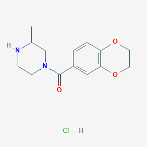 molecular formula C14H19ClN2O3 B2562255 (2,3-Dihydrobenzo[b][1,4]dioxin-6-yl)(3-methylpiperazin-1-yl)methanone hydrochloride CAS No. 1353958-43-6