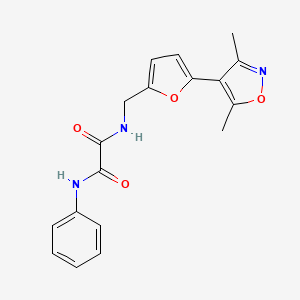 molecular formula C18H17N3O4 B2563205 N-[[5-(3,5-Dimethyl-1,2-oxazol-4-yl)furan-2-yl]methyl]-N'-phenyloxamide CAS No. 2415509-61-2