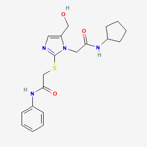 molecular formula C19H24N4O3S B2563356 2-[2-[(2-anilino-2-oxoethyl)thio]-5-(hydroxymethyl)-1H-imidazol-1-yl]-N-cyclopentylacetamide CAS No. 923244-25-1