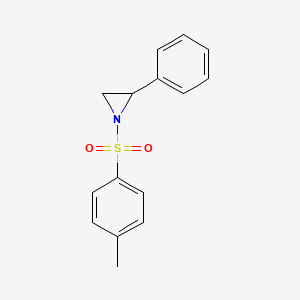 molecular formula C15H15NO2S B2563476 1-[(4-Methylphenyl)sulfonyl]-2-phenylaziridine CAS No. 24395-14-0