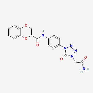 molecular formula C18H16N6O5 B2564436 N-(4-(4-(2-amino-2-oxoethyl)-5-oxo-4,5-dihydro-1H-tetrazol-1-yl)phenyl)-2,3-dihydrobenzo[b][1,4]dioxine-2-carboxamide CAS No. 1396798-59-6