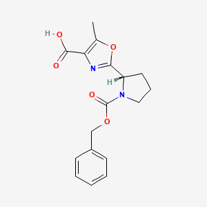molecular formula C17H18N2O5 B2564472 2-{(2S)-1-[(benzyloxy)carbonyl]pyrrolidin-2-yl}-5-methyl-1,3-oxazole-4-carboxylic acid CAS No. 203782-27-8
