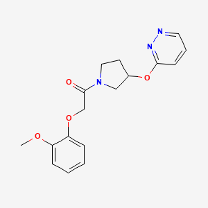 2-(2-Methoxyphenoxy)-1-(3-(pyridazin-3-yloxy)pyrrolidin-1-yl)ethanone