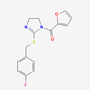 molecular formula C15H13FN2O2S B2565659 [2-[(4-Fluorophenyl)methylsulfanyl]-4,5-dihydroimidazol-1-yl]-(furan-2-yl)methanone CAS No. 851800-28-7