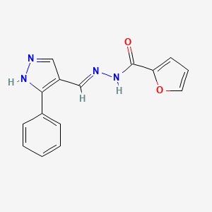 molecular formula C15H12N4O2 B2567797 N'-[(E)-(3-phenyl-1H-pyrazol-4-yl)methylidene]-2-furohydrazide CAS No. 477710-89-7