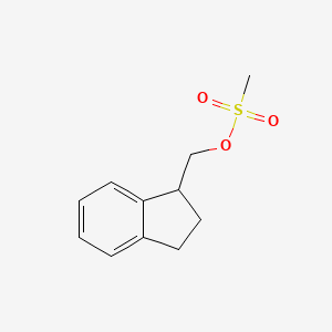2,3-dihydro-1H-inden-1-ylmethyl methanesulfonate