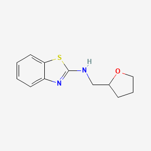 B2568556 N-((tetrahydrofuran-2-yl)methyl)benzo[d]thiazol-2-amine CAS No. 684217-25-2