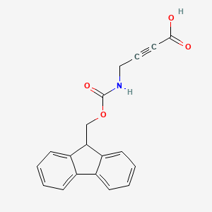 molecular formula C19H15NO4 B2569287 4-(9H-芴-9-基甲氧羰氨基)丁-2-炔酸 CAS No. 1189357-50-3