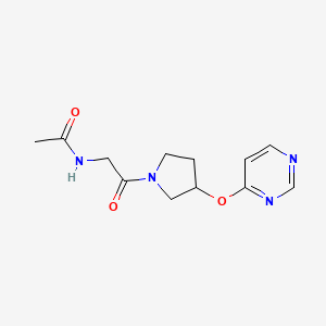 molecular formula C12H16N4O3 B2569594 N-(2-oxo-2-(3-(pyrimidin-4-yloxy)pyrrolidin-1-yl)ethyl)acetamide CAS No. 2034572-08-0