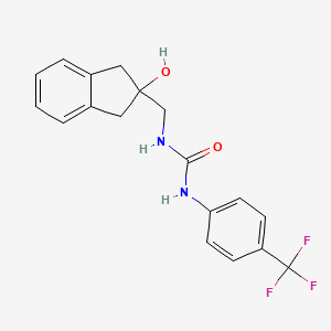 molecular formula C18H17F3N2O2 B2570354 1-((2-hydroxy-2,3-dihydro-1H-inden-2-yl)methyl)-3-(4-(trifluoromethyl)phenyl)urea CAS No. 2034529-29-6