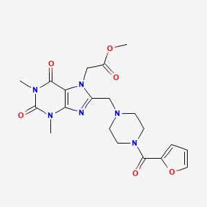 molecular formula C20H24N6O6 B2570520 Methyl 2-[8-[[4-(furan-2-carbonyl)piperazin-1-yl]methyl]-1,3-dimethyl-2,6-dioxopurin-7-yl]acetate CAS No. 851940-50-6