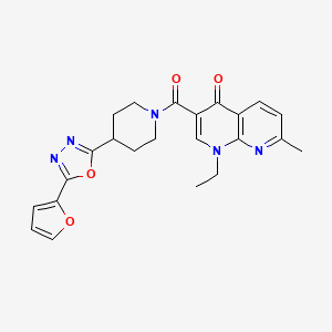 1-ethyl-3-(4-(5-(furan-2-yl)-1,3,4-oxadiazol-2-yl)piperidine-1-carbonyl)-7-methyl-1,8-naphthyridin-4(1H)-one