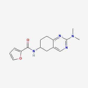 molecular formula C15H18N4O2 B2572781 N-[2-(二甲氨基)-5,6,7,8-四氢喹唑啉-6-基]呋喃-2-甲酰胺 CAS No. 2097869-11-7