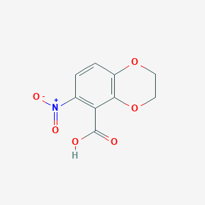 molecular formula C9H7NO6 B2572865 6-Nitro-2,3-dihydro-1,4-benzodioxine-5-carboxylic acid CAS No. 66411-31-2