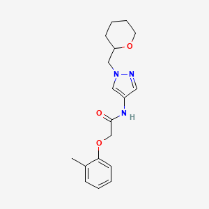 molecular formula C18H23N3O3 B2572956 N-(1-((四氢-2H-吡喃-2-基)甲基)-1H-吡唑-4-基)-2-(邻甲氧基苯氧基)乙酰胺 CAS No. 2034228-23-2