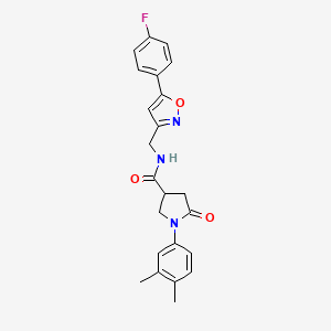 molecular formula C23H22FN3O3 B2574124 1-(3,4-dimethylphenyl)-N-((5-(4-fluorophenyl)isoxazol-3-yl)methyl)-5-oxopyrrolidine-3-carboxamide CAS No. 953181-84-5