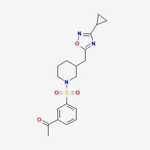 molecular formula C19H23N3O4S B2574361 1-(3-((3-((3-Cyclopropyl-1,2,4-oxadiazol-5-yl)methyl)piperidin-1-yl)sulfonyl)phenyl)ethanone CAS No. 1705940-90-4