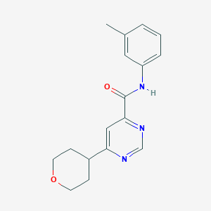 N-(3-Methylphenyl)-6-(oxan-4-yl)pyrimidine-4-carboxamide